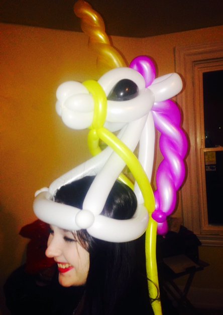 Unicorn hat balloon twisting