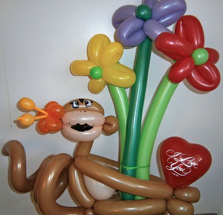 Monkey with a flower balloon centerpieces