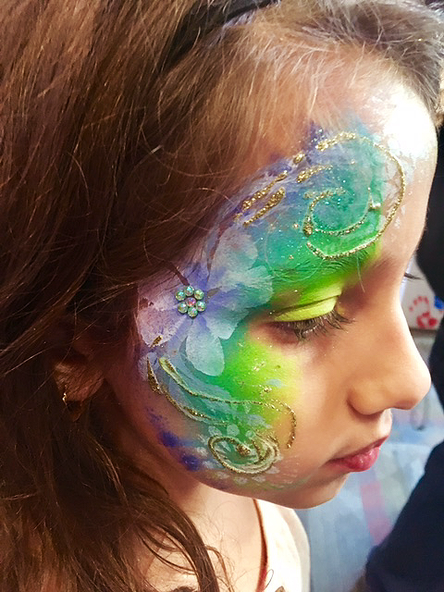 Floral face painting with sequins