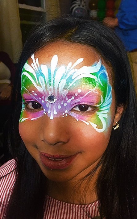Beautiful rainbow butterfly face painting
